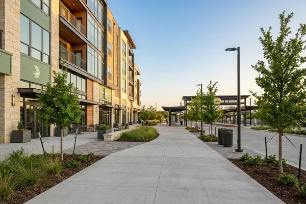 Walking path from a new apartment building to a DART station