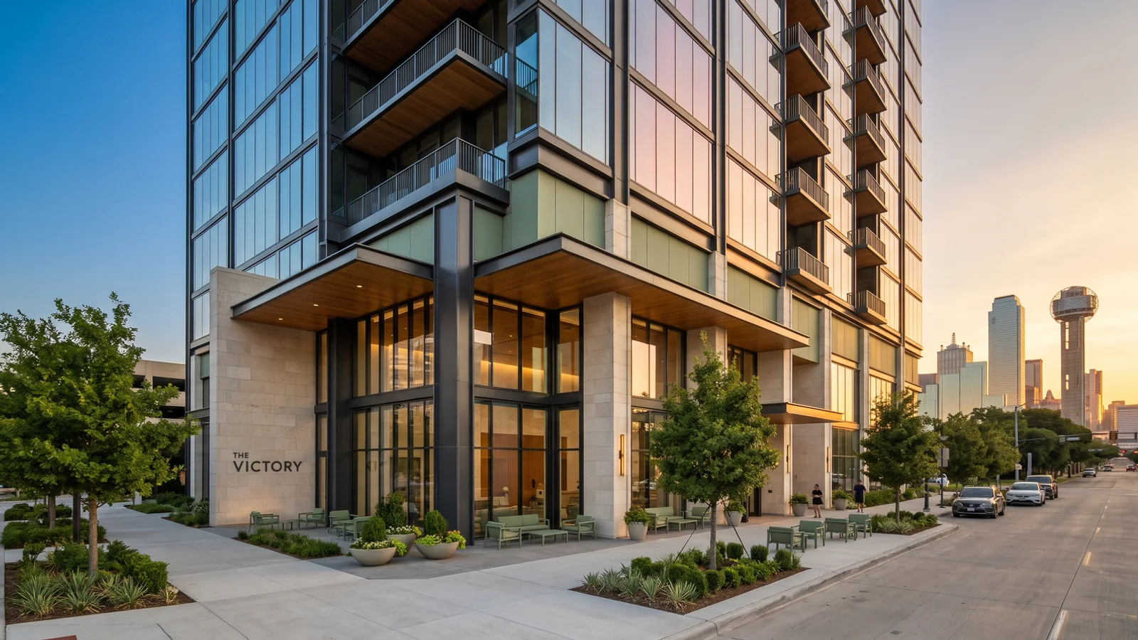 New high-rise apartment tower in Victory Park with the downtown Dallas skyline